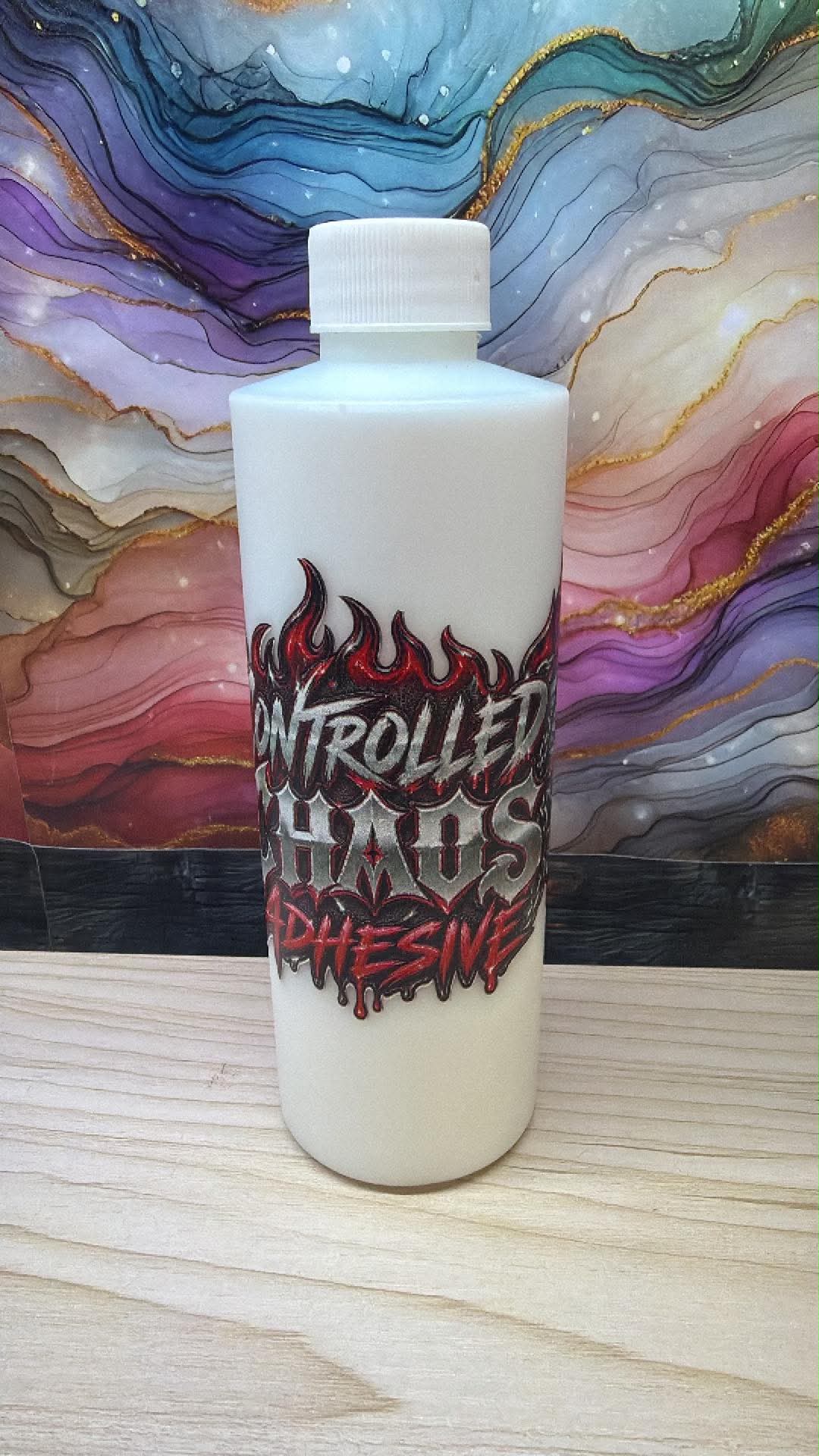 CONTROLLED CHAOS ADHESIVE